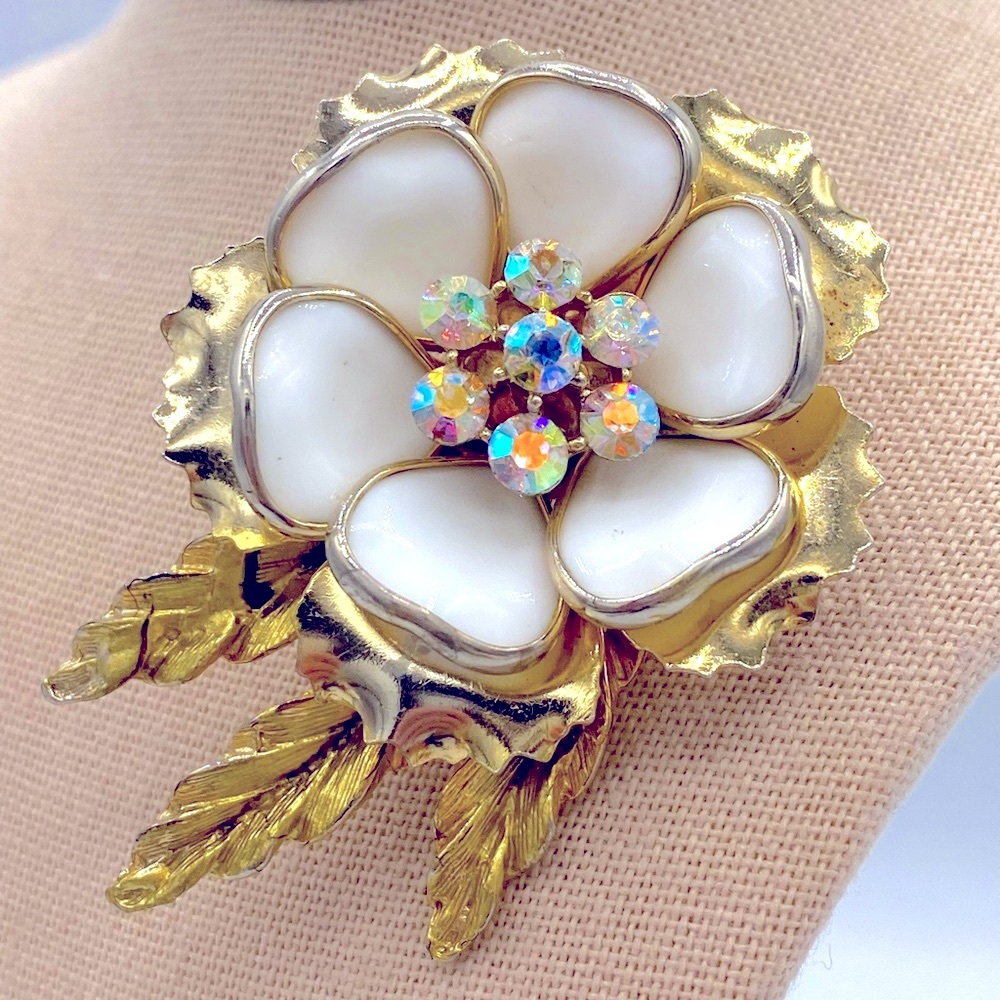 Vintage Gold Tone White Enamel Floral Brooch With Good Aurora Borealis Center
